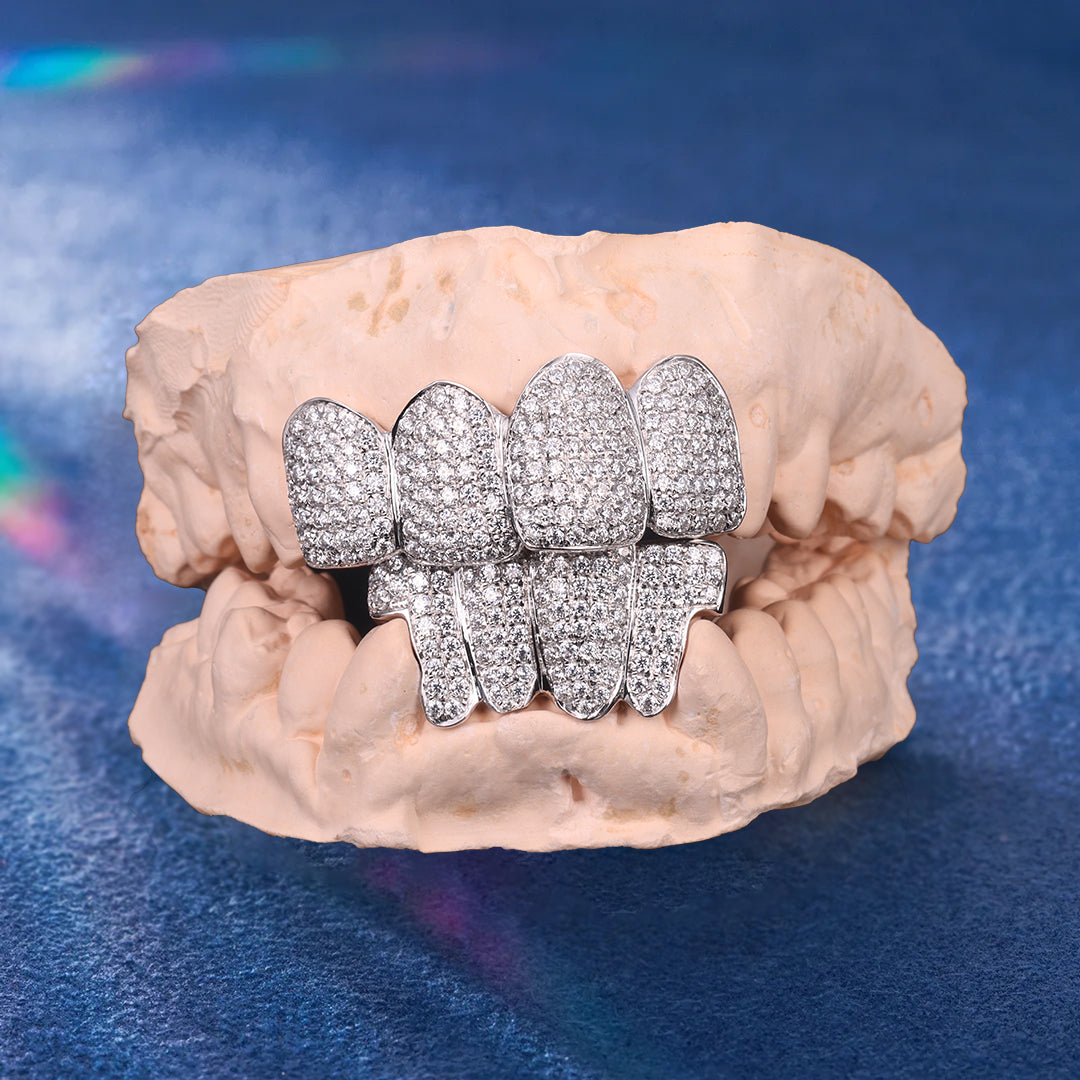 Moissanite grillz on white background showcasing shine