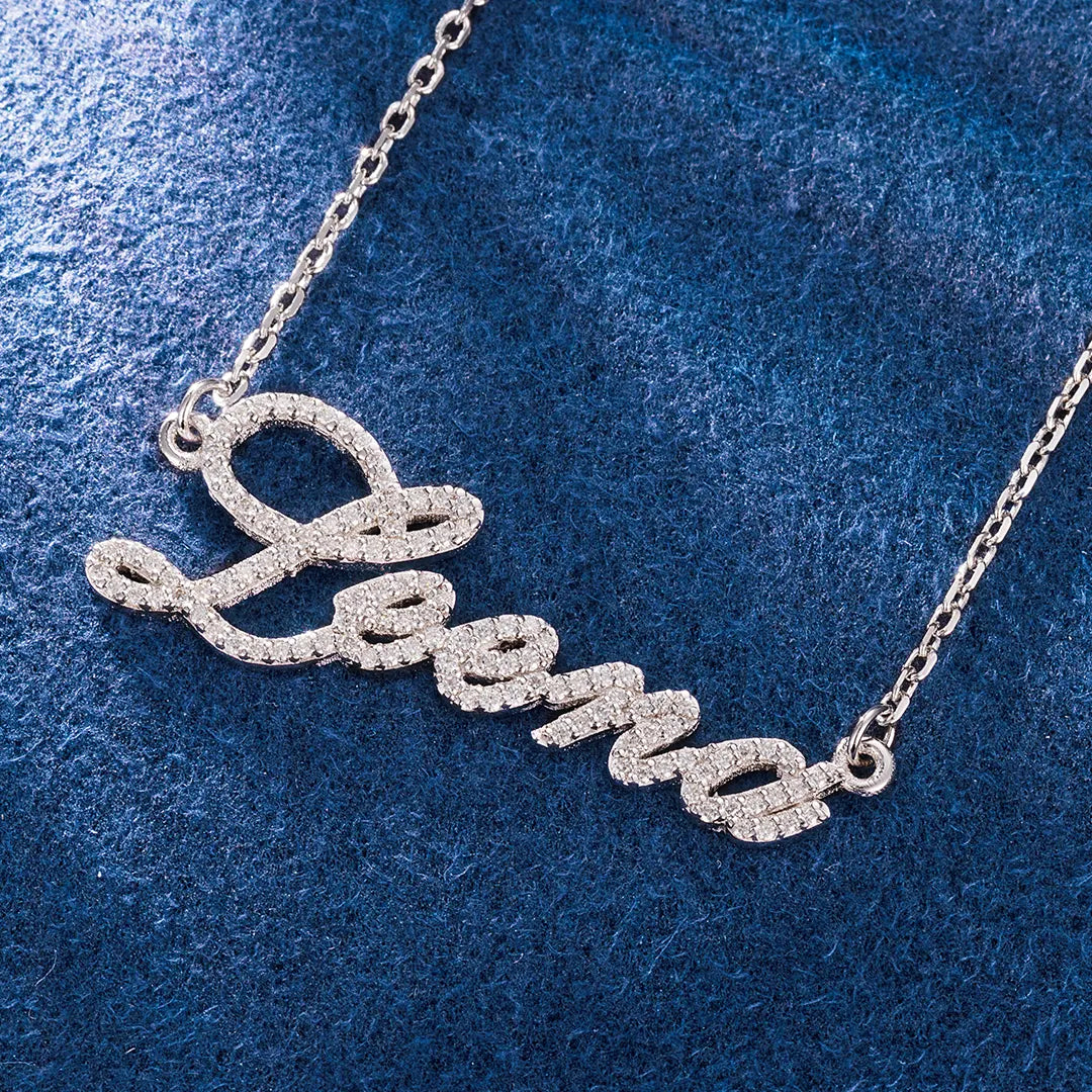 Polished gold initial pendant for layered chain looks